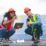 specialist-technician-professional-engineer-checking-top-view-of-installing-factory-solar-roof-panel.webp
